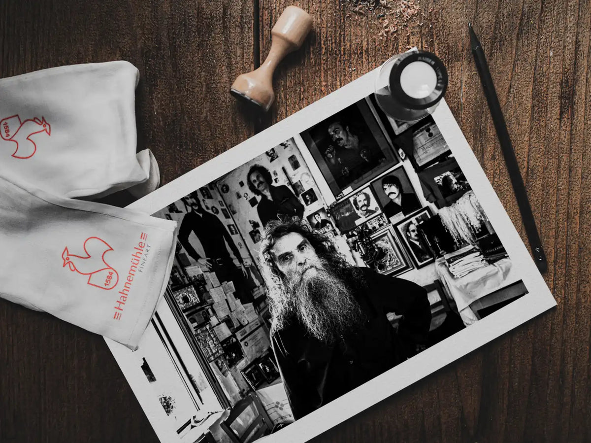 Black and White Photography Wall Art Greece | Antonis Xylouris (Psarantonis) in his brother’s house Anogia Crete by George Tatakis - photo print on table
