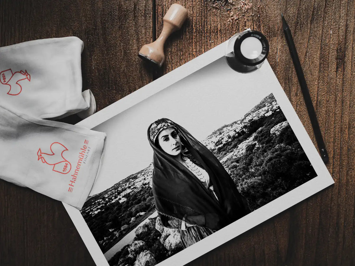 Black and White Photography Wall Art Greece | Traditional costume of Archangelos overlooking the town Rhodes by George Tatakis - photo print on table