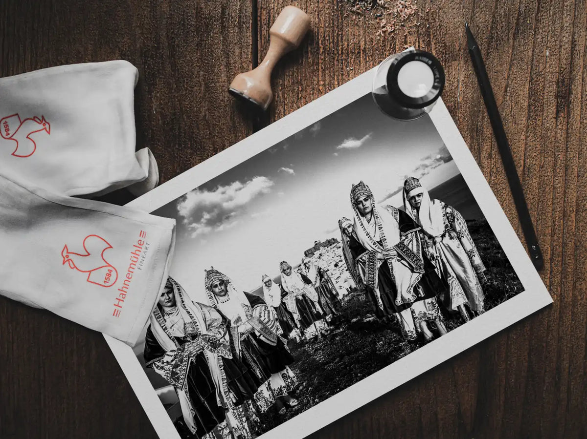 Black and White Photography Wall Art Greece | Costume of Astypalaea on a cliff overlooking the castle Dodecanese by George Tatakis - photo print on table