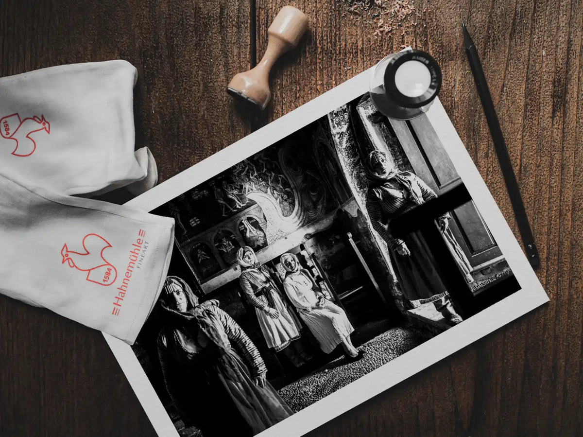 Black and White Photography Wall Art Greece | Traditional costumes of Gennadi in a local church Rhodes by George Tatakis - photo print on table