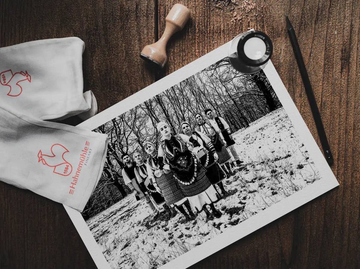 Black and White Photography Wall Art Greece | Costumes of Kladorachi in the snow Florina W. Macedonia by George Tatakis - photo print on table