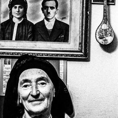 Black and White Photography Wall Art Greece | Woman in a traditional house Olympos Karpathos Dodecanese by George Tatakis - detailed view