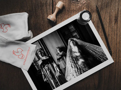 Black and White Photography Wall Art Greece | Three ladies in the traditional costumes of Symi island inside a room Dodecanese Greece by George Tatakis - photo print on table