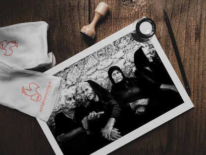 Black and White Photography Wall Art Greece | Gossiping in Egglouvi Lefkada Ionian by George Tatakis - photo print on table