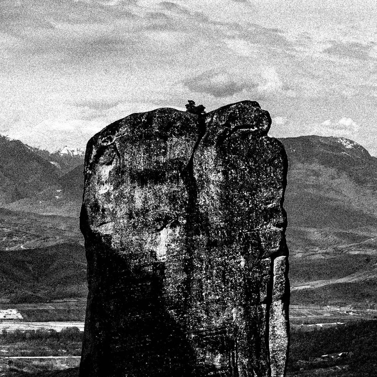 Rock pillars at Meteora. Black-and-white photography print by George Tatakis from the project Chorōs. Close-up detail