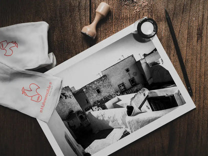 Dance of Houses, Emporio | Santorini | Chorōs | Black-and-white wall art photography from Greece - photo print on table