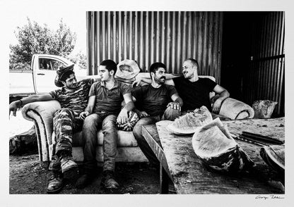 Black and White Photography Wall Art Greece | A group of men in a sofa after work Anogia Crete