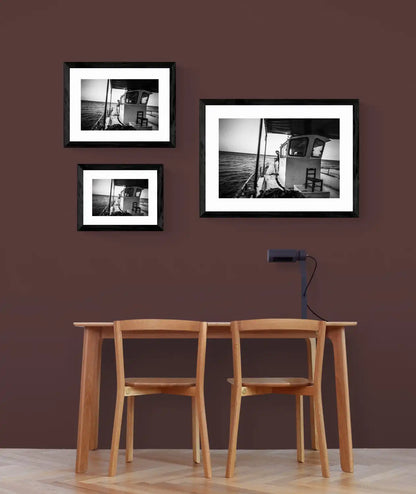 Black and White Photography Wall Art Greece | Fisherman with nets on his boat in Diafani Olympos Karpathos Dodecanese by George Tatakis - framing options