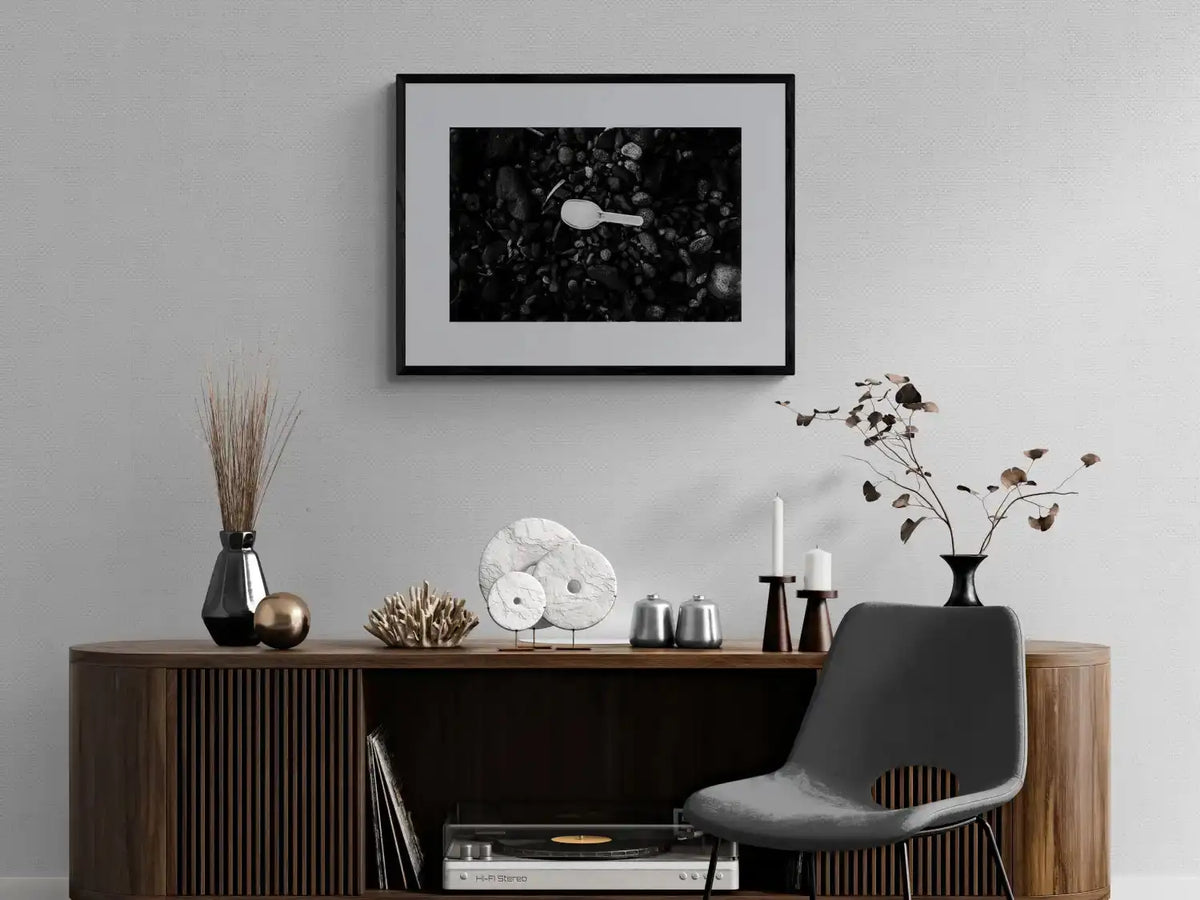 Black Pebbles and Shovel | Santorini | Chorōs | Black-and-white wall art photography from Greece